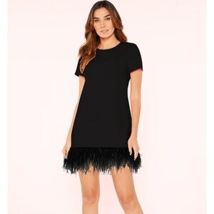 Women’s dress with feather hem